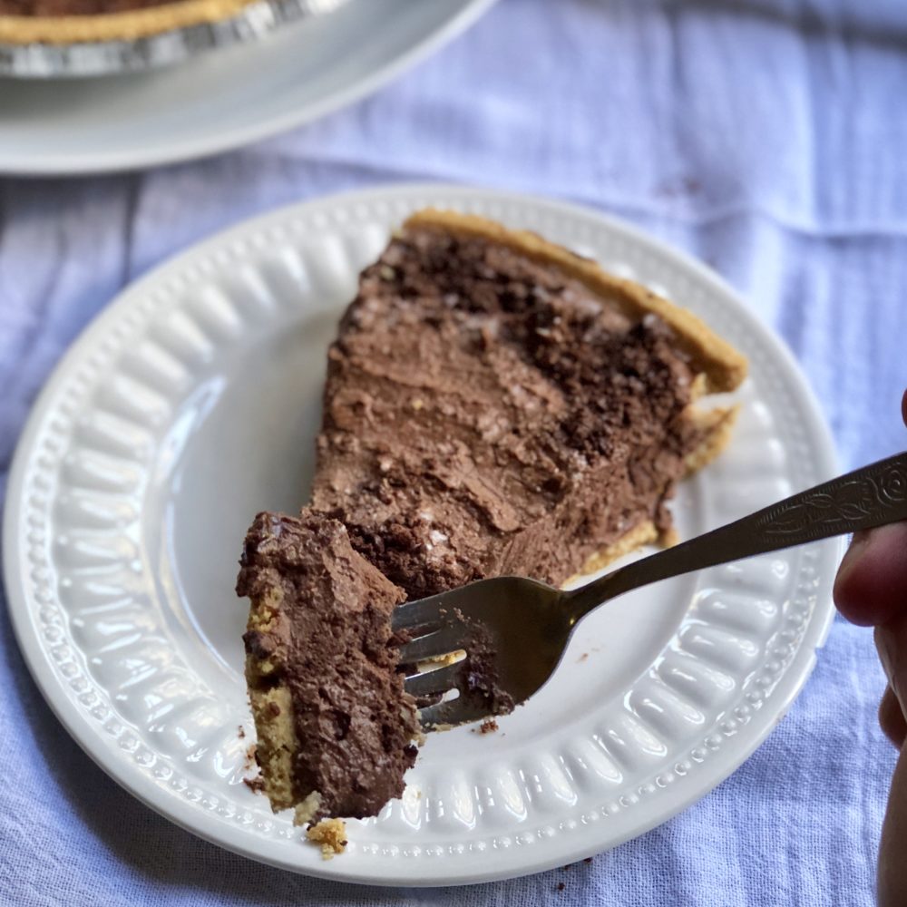 This Chocolate Sweet Potato Pie is a creamy, delicious, and ultra-decadent vegan and gluten-free pie that combines the wonders of sweet potato and chocolate pie all in one. This is one secretly healthy dessert recipe, but no one will know!