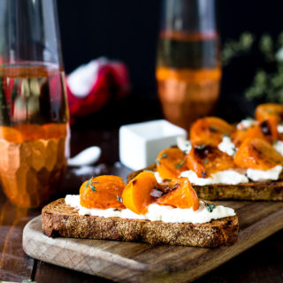 This Roasted Persimmon Burrata Crostini recipe will be the star of the show at your next get together. Roasted persimmon, creamy Burrata cheese, and fresh thyme top crunchy bread for an appetizer that's irresistible!