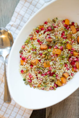 Celebrate your favorite flavors of the season in a healthy way when you whip up this Pomegranate Butternut Squash Coucous topped with a heavenly pistachio crumble. Winter never tasted so good!