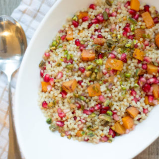 Celebrate your favorite flavors of the season in a healthy way when you whip up this Pomegranate Butternut Squash Coucous topped with a heavenly pistachio crumble. Winter never tasted so good!