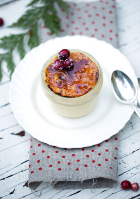 This Egg Nog Creme Brulee with Cranberry Sugar is a simple, make-ahead dessert that's a sure-fire way to wow holiday guests. Very elegant and refined, this classic Christmas dessert gets a festive makeover from the flavors of egg nog, warm spices, and cranberry sugar.