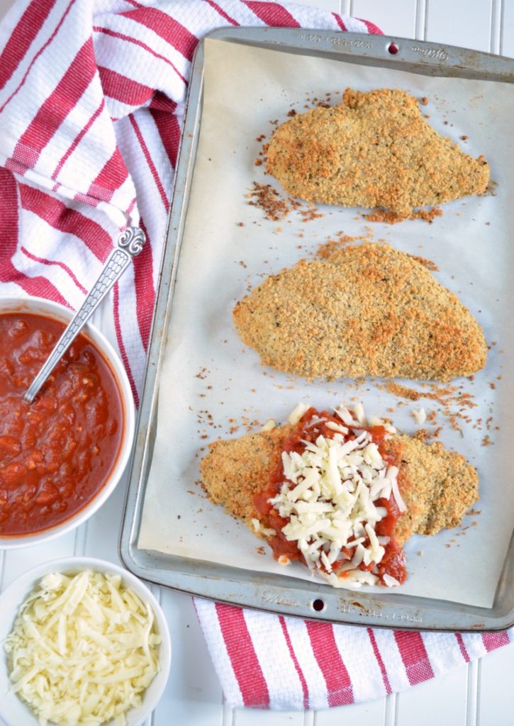 Looking for a healthier classic that the entire family will love? This easy Baked Chicken Parmesan recipe is what you need! It’s a lightened-up version of a favorite family recipe that’s delicious and packed with flavor.