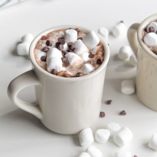 When you snuggle up by the fire with a loved one and two mugs full of creamy goodness, your winter is sure to be just as sweet as these four Festive Hot Chocolate recipes!