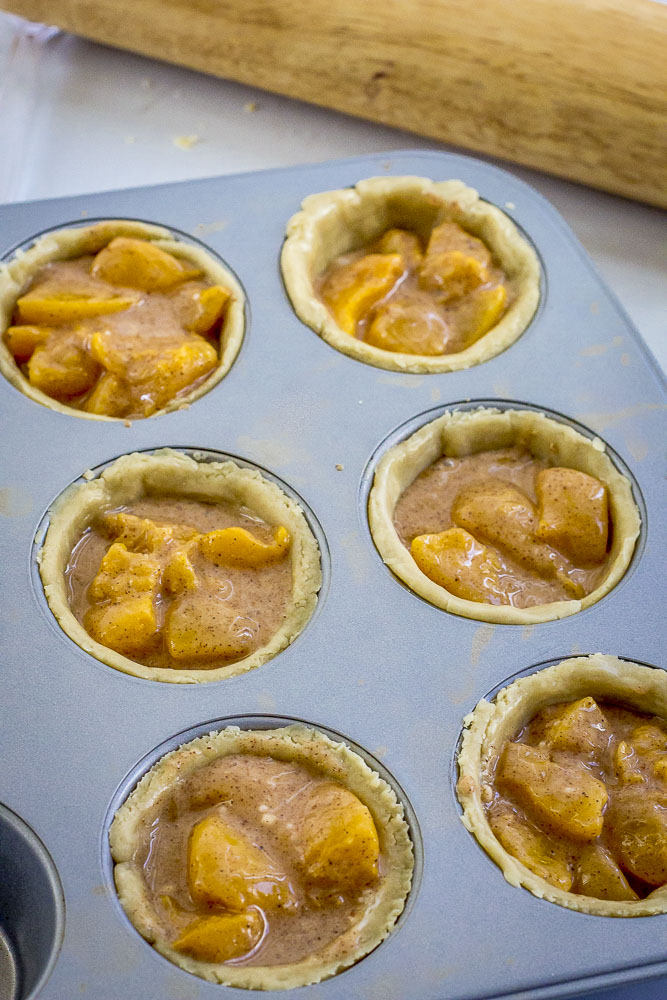 This Southern Mini Peach Cobbler recipe is a time-tested mini dessert that's so simple to make, you can even get the kids involved! The versatility of this recipe lends itself to so many varieties and it's the perfect dessert for entertaining a crowd!