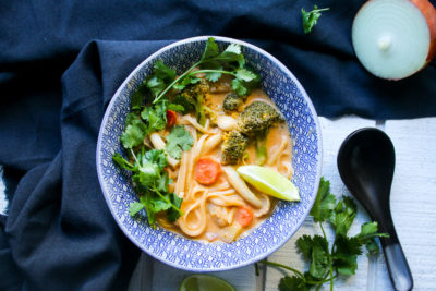 Looking to beat the chill this winter? Warm up with a big bowl of this Thai-inspired Veggie Coconut Curry Noodle Soup! This wonderful bowl of comfort food is ready in less than 30 minutes!