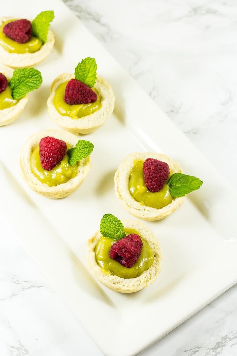 Made with a sweet and tart DIY lemon curd, these Mini Lemon Tarts are the perfect mini dessert to impress your family and friends. With no special equipment required, these bakery-style treats are a lemony sweet delight.
