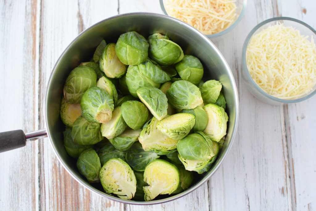 This One-Pan Cheesy Brussels Sprouts Bake is a 30-minute side dish featuring the vegetable of the season! Our simple recipe is sure to impress at weeknight meals or potlucks. 