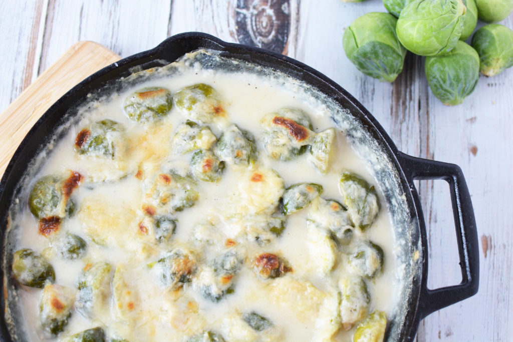 This One-Pan Cheesy Brussels Sprouts Bake is a 30-minute side dish featuring the vegetable of the season! Our simple recipe is sure to impress at weeknight meals or potlucks. 