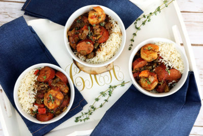 Cook to impress when you make this Insanely Delicious Shrimp Sausage Gumbo rice bowl. This hearty comfort food gets its New Orlean's style flavor from smoky sausage, shrimp, herbs, and fresh vegetables.