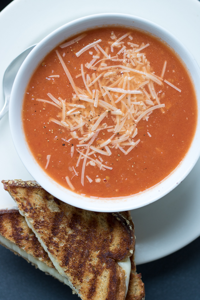 Just like mom used to make only better because the soup doesn't come out of a can, this healthy comfort food is a deli-style meal you'll love. Homemade Tomato Soup and Grilled Cheese is exactly the 30-minute meal your lunchtime needs!