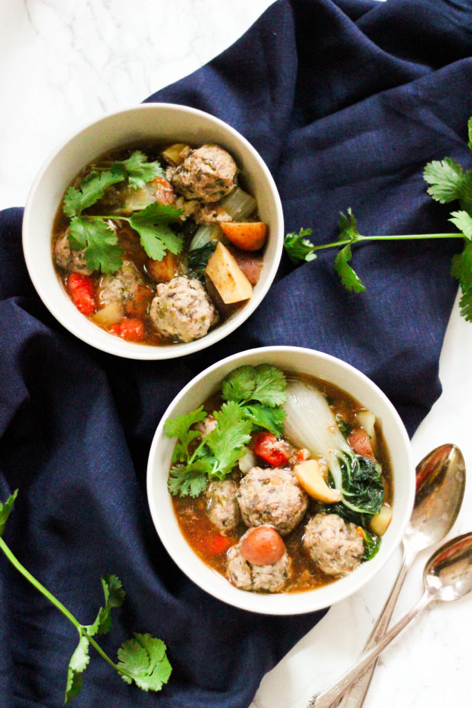 This Paleo Slow Cooker Wonton Meatball Stew is a simple comfort food that's perfect for a weeknight meal. This one-pot meal is full of homemade meatballs, vegetables, and amazing Asian flavors!