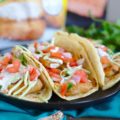 These 30-Minute Beer Battered Fish Tacos are the perfect weeknight meal. This simple semi-homemade dish comes together quickly with prepared fish, pico, slaw, and homemade cilantro lime sauce.