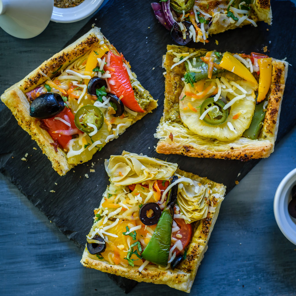 This Roasted Vegetable Puff Pastry Pizza is the perfect healthy comfort food. The simple puff pastry base makes this semi-homemade meal quick enough for a weeknight meal, but fancy enough for a date night in when you're cooking for two.