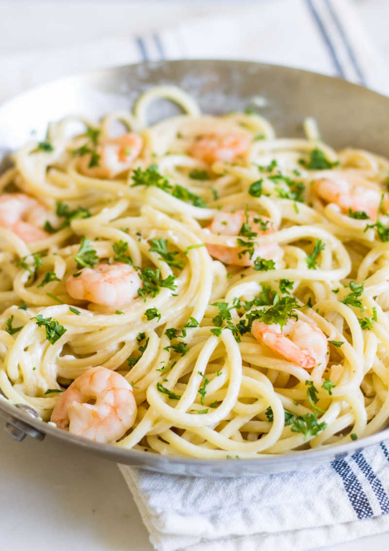 This recipe for Shrimp Scampi Pasta takes the classic recipe to a new level. Not only is this a 30-minute meal, but this quick and easy weeknight dinner delivers a dish that's got bright citrus notes and a creamy texture you'll love with the help of a secret ingredient!