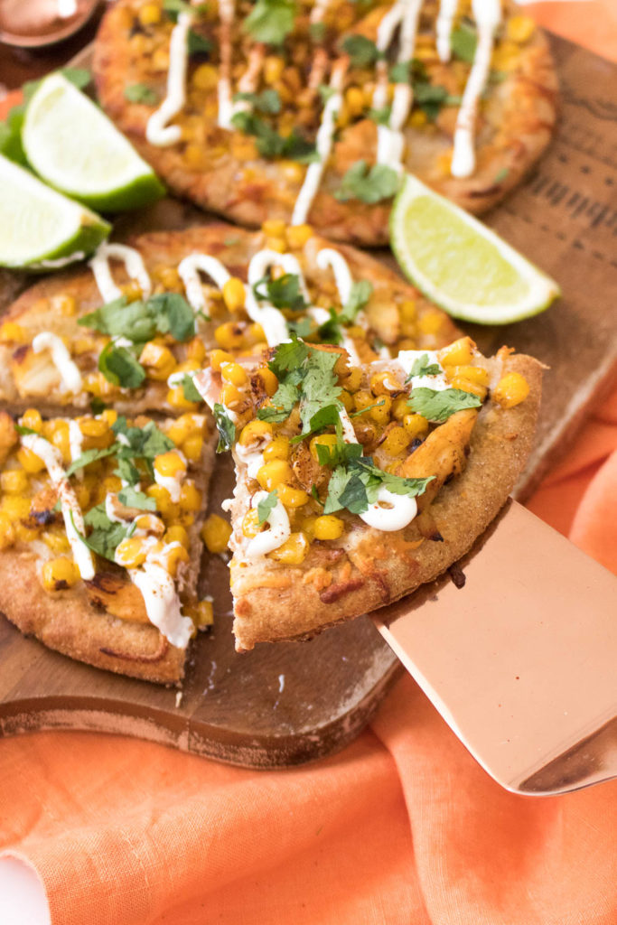These personal-sized Spicy Chicken Street Corn Pita Pizzas are perfect if you're cooking for two. Inspired by the flavors of Mexican Street Corn, this semi-homemade, 30-minute meal is perfect for date night!