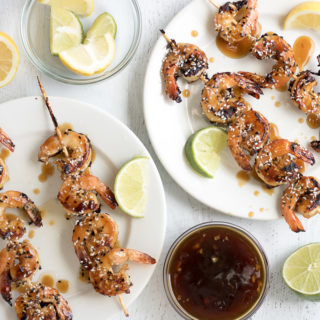 Grilled Teriyaki Sesame Shrimp uses fresh jumbo shrimp and a homemade teriyaki sauce. It's perfect as an appetizer for outdoor entertaining or on its own over rice as a weeknight meal. This shrimp on a stick is finger-licking good!
