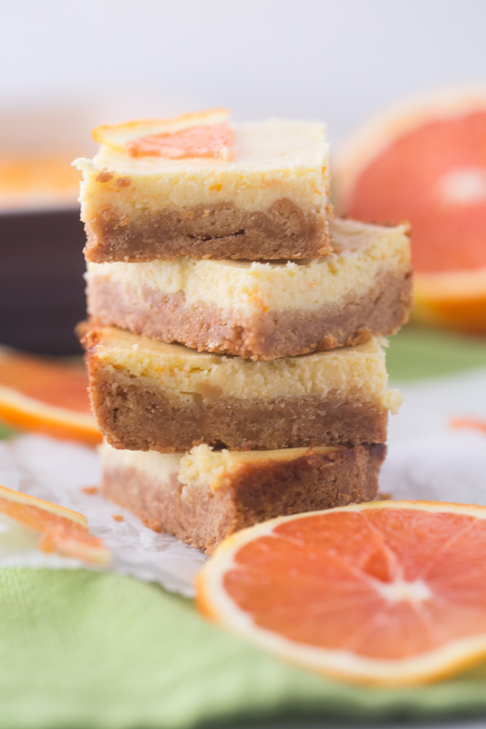 Impress family and friends with this easy dessert recipe. Only one bowl and a handful of ingredients makes this recipe for 6-Ingredient Orange Cheesecake Bars a winner every time. Cheat day just got a fresh citrus makeover!
