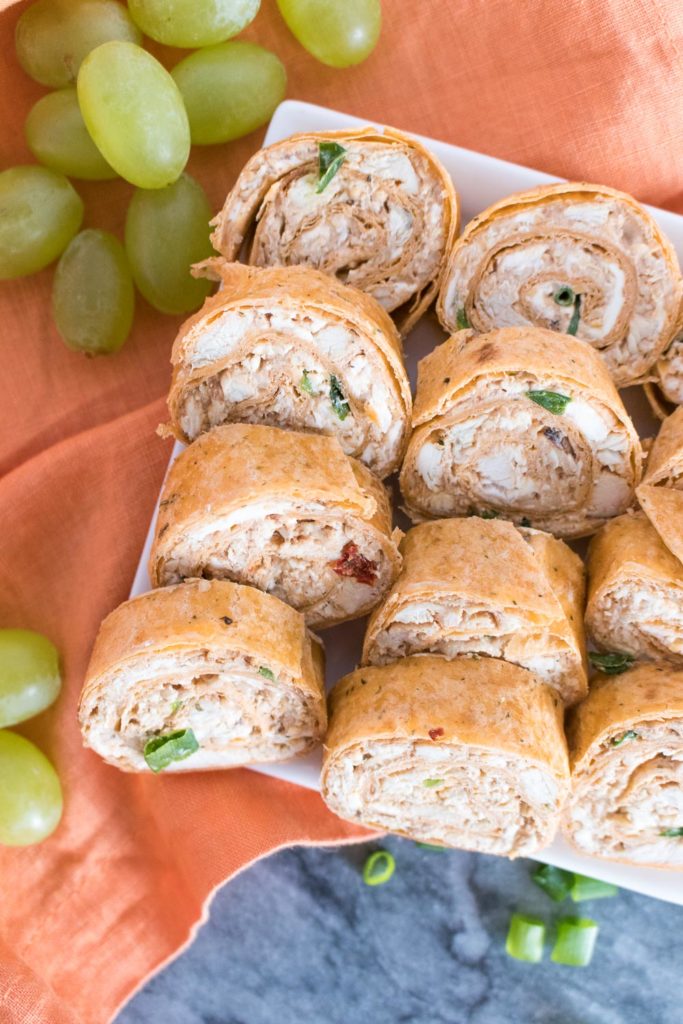 Simple BBQ Chicken Pinwheels are the perfect kid-friendly lunch, party appetizer, or picnic food. With mere minutes of prep time, this versatile recipe delivers flavors everyone will love in a bite-sized rollup. 