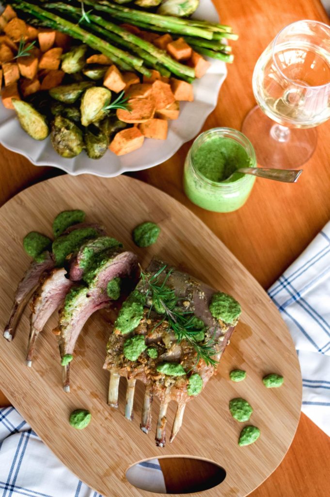 Cook to impress your Sunday brunch crowd when you make this fancy Mint Pesto Rack of Lamb. Perfect for Easter, a Sunday supper, or any other celebration. Serve with roasted brussels sprouts, sweet potatoes, and asparagus for a family-style meal everyone will love!
