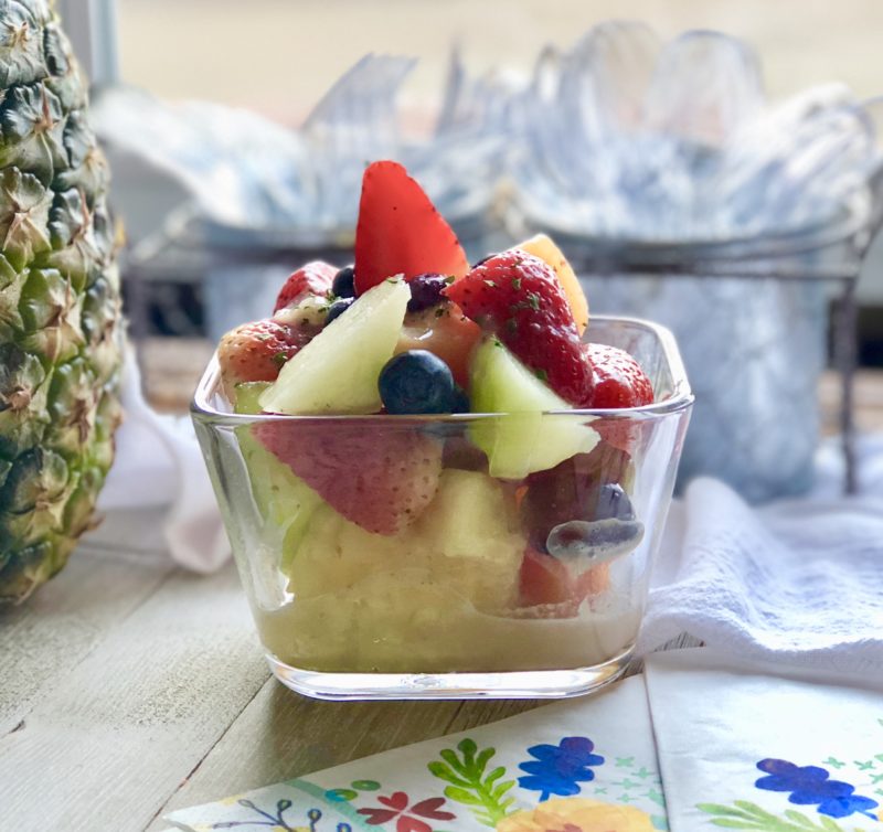 What's not to love about this Tropical Fruit Salad with Coconut Yogurt? This dairy-free dessert is a simple recipe with six types of fresh fruit you can pick up at your local farmers market and it's perfect for picnics!