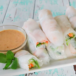 Perfect for picnics, as a party appetizer, or a healthy quick meal, these Shrimp Rice Paper Rolls are ready in 15 minutes. Fresh veggies and flavorful shrimp are wrapped up in rolls and served with Peanut Sauce for dipping.