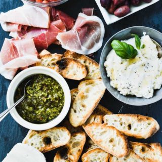 Summer BBQ and picnic season is quickly approaching. One low-stress solution for summer entertaining is creating a bruschetta bar for your friends to enjoy. With three steps you can have an easy appetizer table to impress guests!
