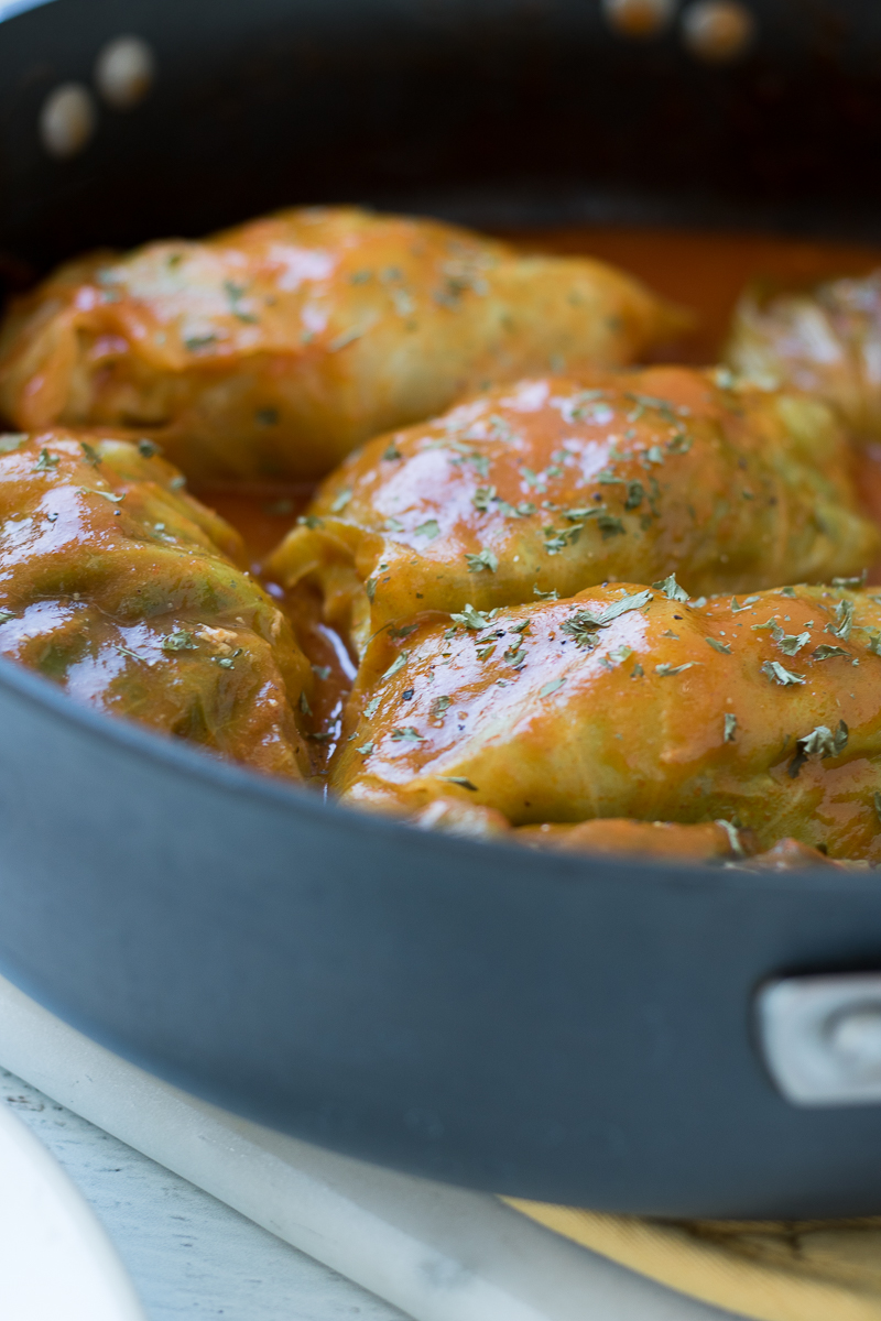 Filled with either lean ground turkey or beef, these Stuffed Cabbage Rolls are served with a tomato sauce and are sure to impress a dinner crowd. This simple weeknight meal is popular in Eastern Europe, the Mediterranean, and parts of Asia. This classic comfort food is a hit every time!
