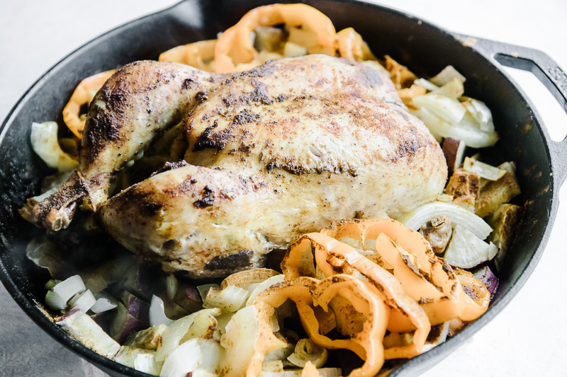 Jamaican Curry Roast Chicken, a one pot meal of roasted whole chicken that serves as meal prep all week long. Over a salad, over rice, in a soup, or even on its own, make this curry-spiced roast chicken and vegetables once for family meals all week long.