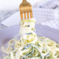 This simple 5-Ingredient Zucchini Noodle Alfredo is lightened up with low fat ingredients and spiralized zucchini noodles for a veggie-packed, one-pot dish that's ready in 15 minutes!