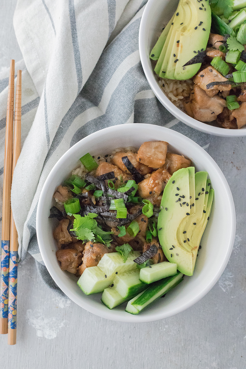 This Teriyaki Chicken Rice Bowl is the perfect weeknight dinner. A cheap healthy meal that uses chicken thighs, rice, and a host of flavorful spices. Topped with avocado and cucumber, this dish is reminiscent of sushi in a bowl. To make this a 30-minute meal, you need to read the secret home chef tip!