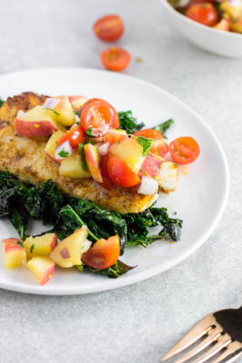 This Baked Cod with Peach Tomato Salsa is a farmers market delight! A 20-minute meal made entirely from fresh farmers market finds that's perfect for your weeknight dinner. A cheap healthy meal bursting with flavor and color!