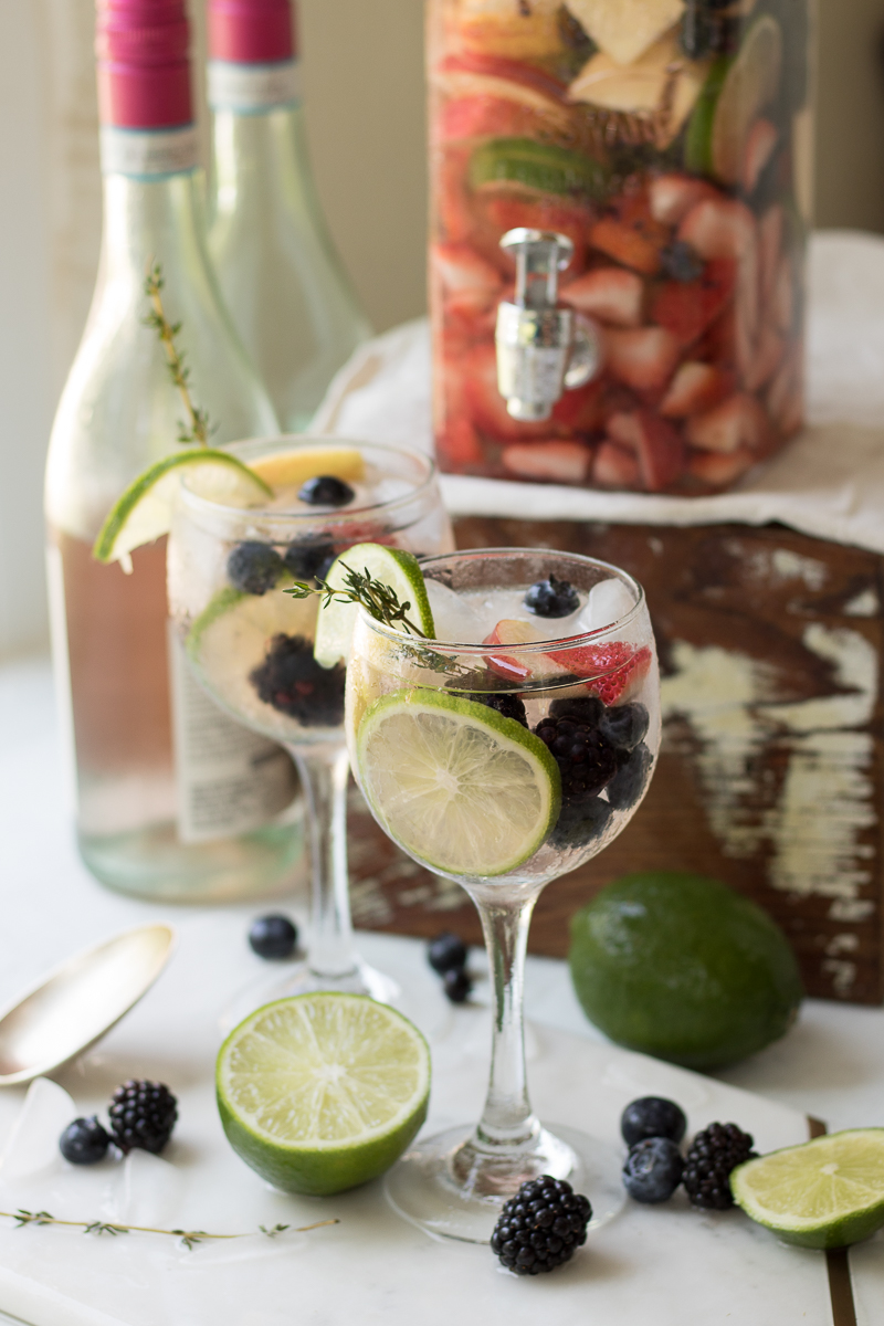 This Rosé Sangria recipe is a light and fruity summer cocktail that's perfect for using those fresh farmers market finds. Serve this refreshing drink for Sunday brunch or outdoor entertaining and you're sure to impress guests!
