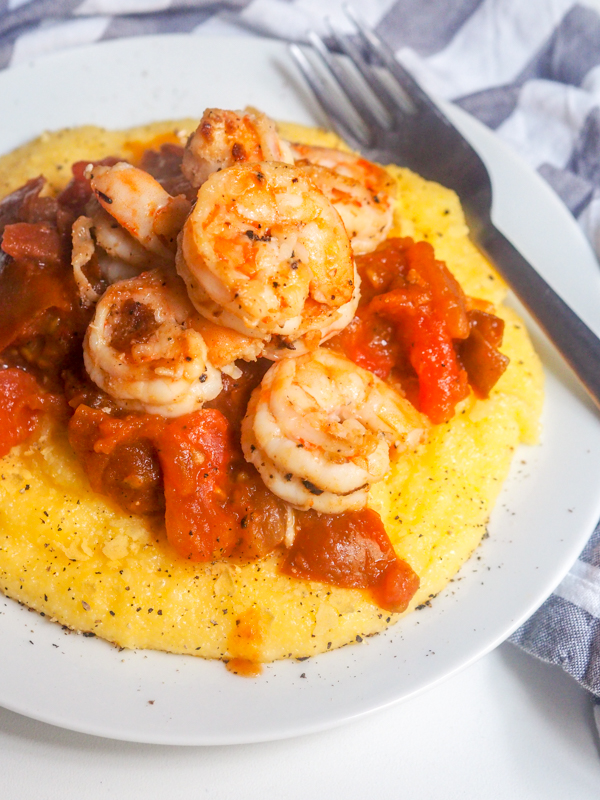 Shrimp and Grits with Tomato Sauce is an iconic southern dish that's perfect for a weeknight meal or Sunday brunch. This easy comfort food is a 30-minute meal that only requires a handful of ingredients.