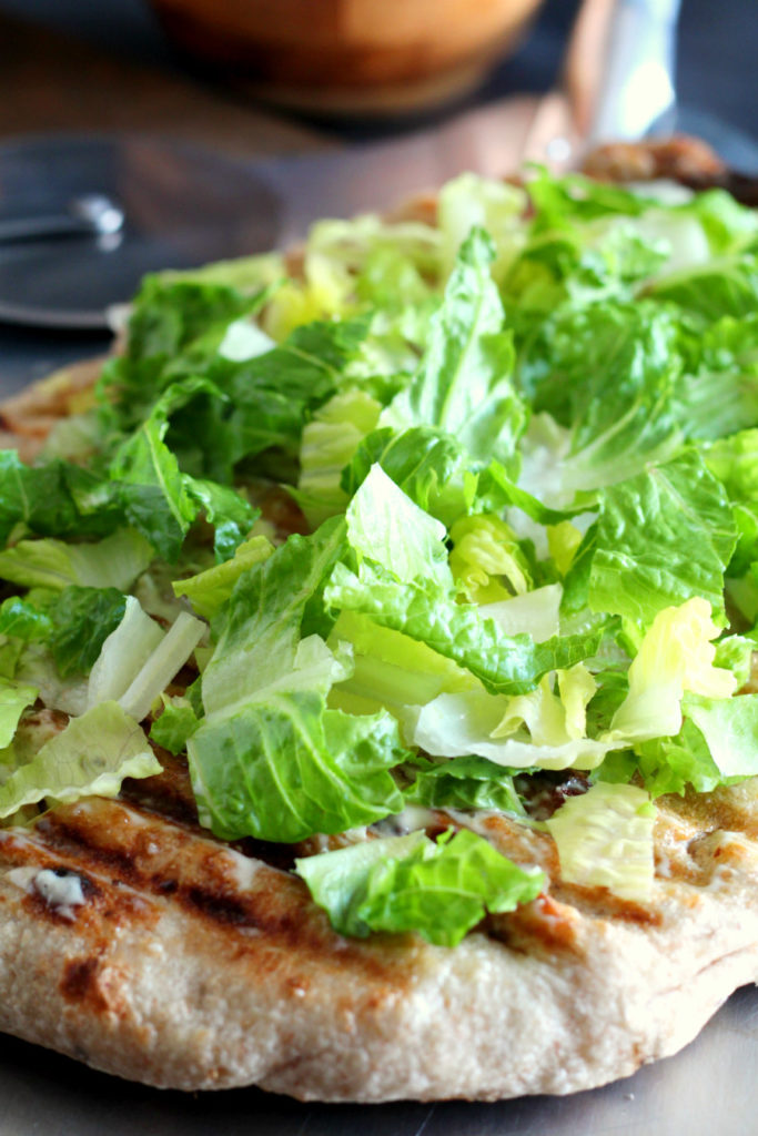 Put a fresh farmers market spin on pizza night with this Grilled Chicken Caesar Salad Pizza! This one-pan meal combines the classic combo of pizza and salad in one slice. A 30-minute meal that's perfect for weeknights or entertaining.