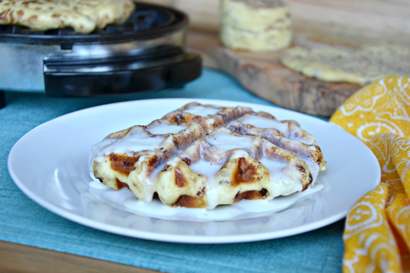 These 2-ingredient, 10-Minute Cinnamon Roll Waffles are a busy mom's best kitchen hack. This budget-friendly breakfast is a kid-approved meal that makes the long wait for cinnamon rolls a thing of the past.