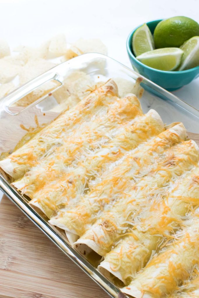 These Creamy 5-Ingredient Chicken Enchiladas are easy to whip up with shredded, leftover chicken, and they freeze well for a simple make-ahead dinner that's guaranteed to be a hit for a quick weeknight meal.