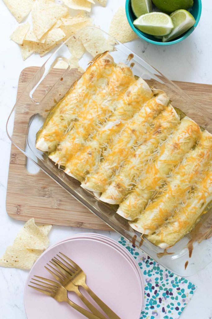 These Creamy 5-Ingredient Chicken Enchiladas are easy to whip up with shredded, leftover chicken, and they freeze well for a simple make-ahead dinner that's guaranteed to be a hit for a quick weeknight meal.