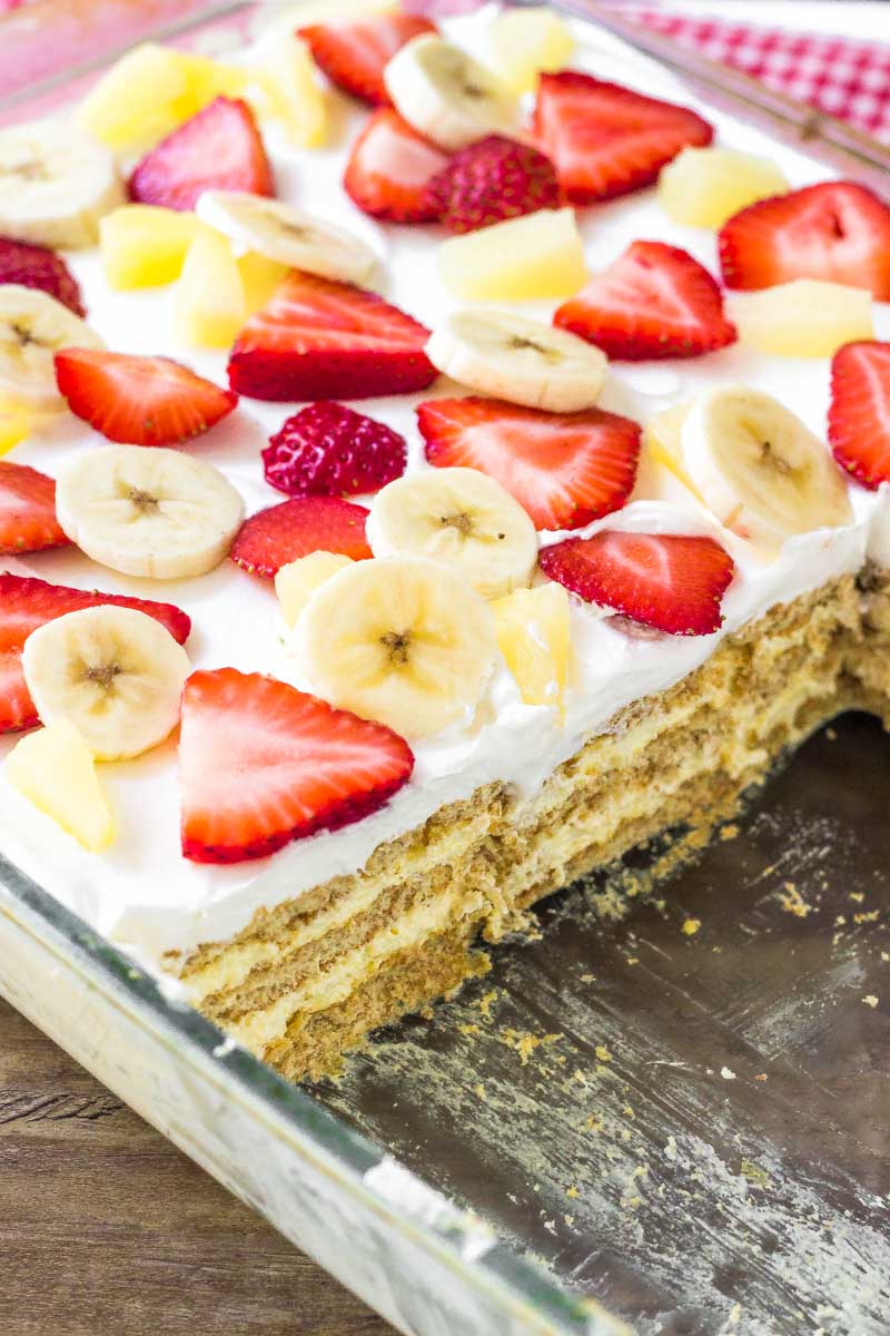 This Banana Split Icebox Cake is the perfect no-bake dessert for summer entertaining. Cold and creamy, feeds a crowd, full of fresh farmers market produce, and sure to be a hit for potlucks.
