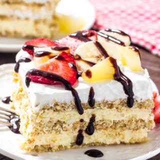 This Banana Split Icebox Cake is the perfect no-bake dessert for summer entertaining. Cold and creamy, feeds a crowd, full of fresh farmers market produce, and sure to be a hit for potlucks.
