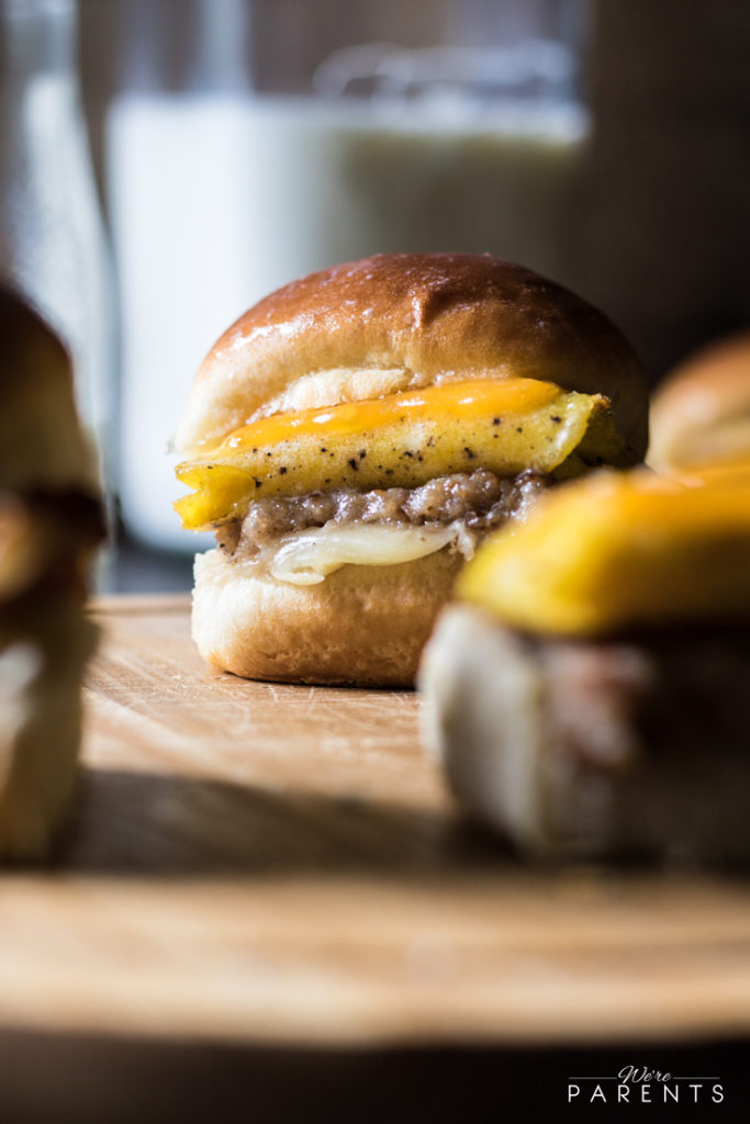 These 30-minute Cheesy Sausage Egg Breakfast Sliders are a great on-the-go breakfast or breakfast menu item for Sunday brunch. A satisfyingly simple, make-ahead breakfast that's sure to please!