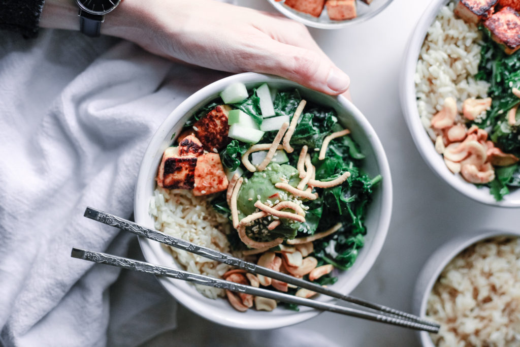 This Sesame Ginger Tofu Poke Bowl is healthy comfort food at its finest. This cheap healthy meal is perfect if you're cooking for two or cooking for a crowd. Who says a vegetarian dinner can't be satisfying?