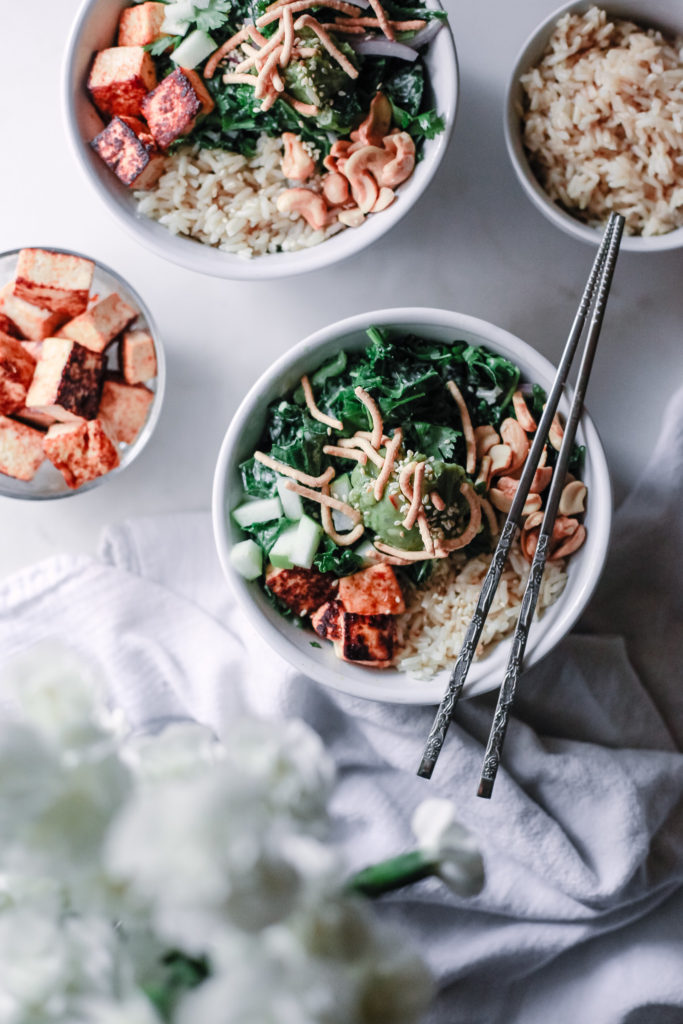 This Sesame Ginger Tofu Poke Bowl is healthy comfort food at its finest. This cheap healthy meal is perfect if you're cooking for two or cooking for a crowd. Who says a vegetarian dinner can't be satisfying?