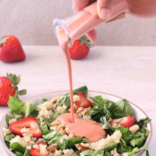 Head to the farmers market and grab a bushel of strawberries because you need to make this 4-Ingredient Strawberry Balsamic Vinaigrette to top your favorite summer salad. Your fresh, healthy dinner awaits!