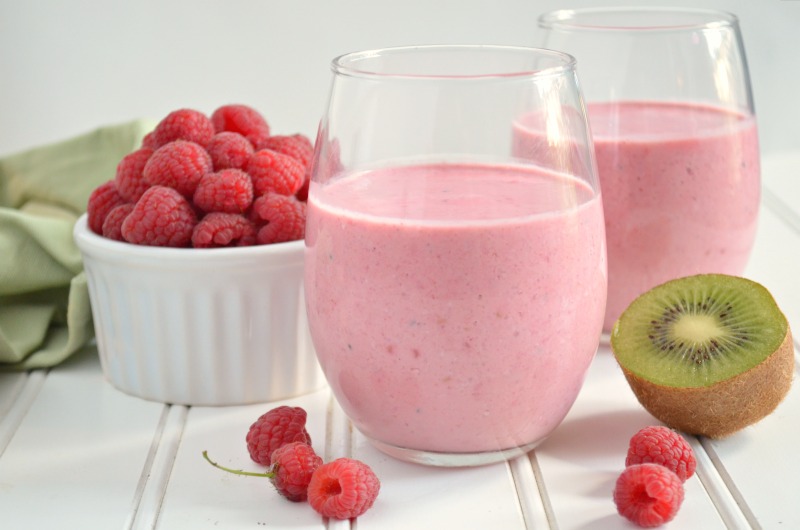 A nutrient-rich breakfast, this Raspberry Kiwi Smoothie recipe uses fresh fruit, Greek yogurt, almond milk, honey, and rolled oats for the perfect 5-minute on-the-go breakfast. It's so pretty, you can serve it for Sunday brunch too!