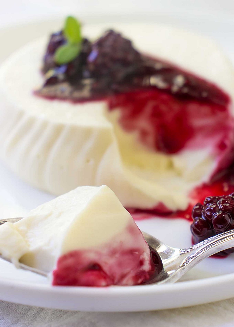 This Vanilla Panna Cotta with Blackberry Sauce is an impressive classic dessert that's perfect for entertaining dinner guests or for a date night in. An Italian no-bake dessert that's ready in just 20 minutes!