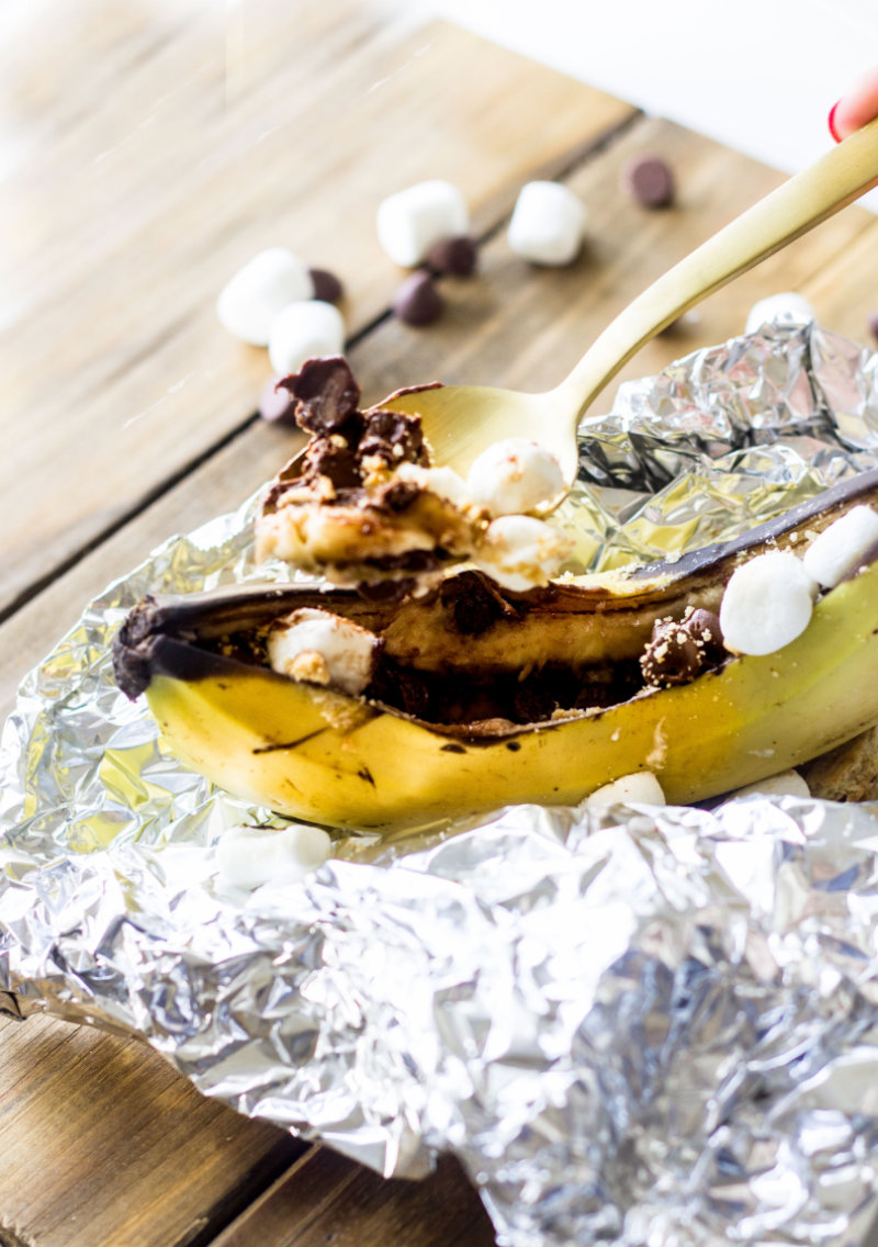 These Grilled Banana S'mores are a simple dessert perfect for outdoor entertaining. Just like the classic dessert, these s'mores use graham crackers, marshmallows, and chocolate, but even better because they're grilled right along side your burgers and corn directly in the peel!