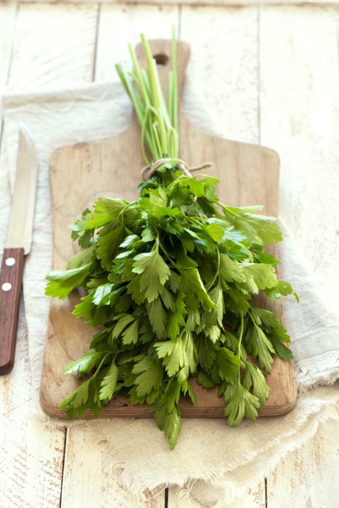 Parsley is a superfood with some pretty surprising Health Benefits that will make you realize it's more than just a pretty garnish. Learn why you should eat more parsley to help with digestion, boost immune system, and more!