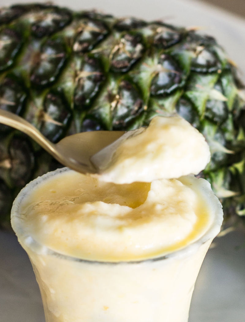Have you ever had a Dole Whip before? Bring the magic of Disney to your outdoor entertaining space with this simple recipe for a Homemade Dole Whip. A 4-ingredient pineapple dessert everyone will love!