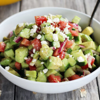 Cucumber Tomato Avocado Salad is a wonderful healthy side dish. This summer salad uses farmers market fresh cucumbers, ripe tomatoes, and creamy avocado for an easy side or light lunch everyone will love.