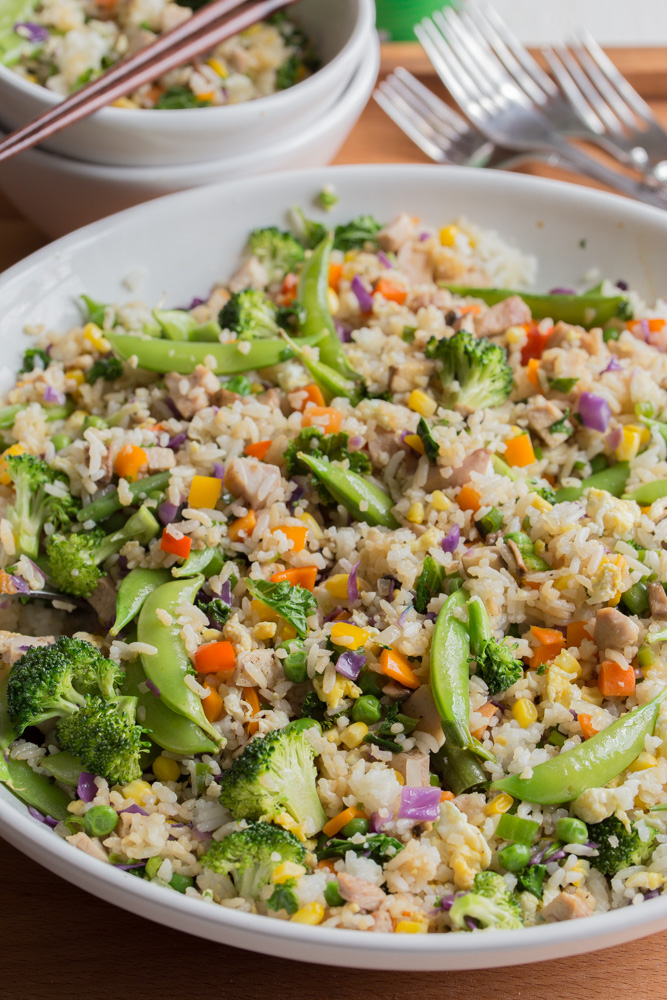 In need of a cheap healthy meal to feed a crowd? This Loaded Fried Rice is a budget-friendly dinner that uses leftovers from your refrigerator. Turn everyone's favorite side dish into a satisfying, 30-minute meal!